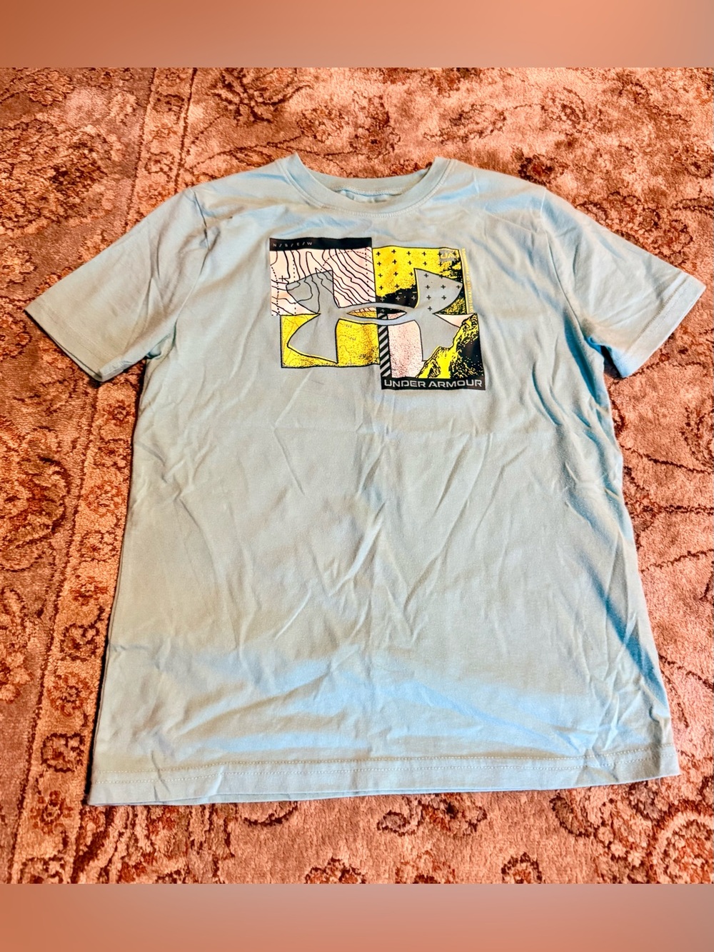 Under Armour Boy’s Light Blue Graphic Short Sleeve Tee with Yellow Accent